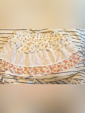Girls Tiered Floral Eyelet Mini Skirt in Cream and Peach